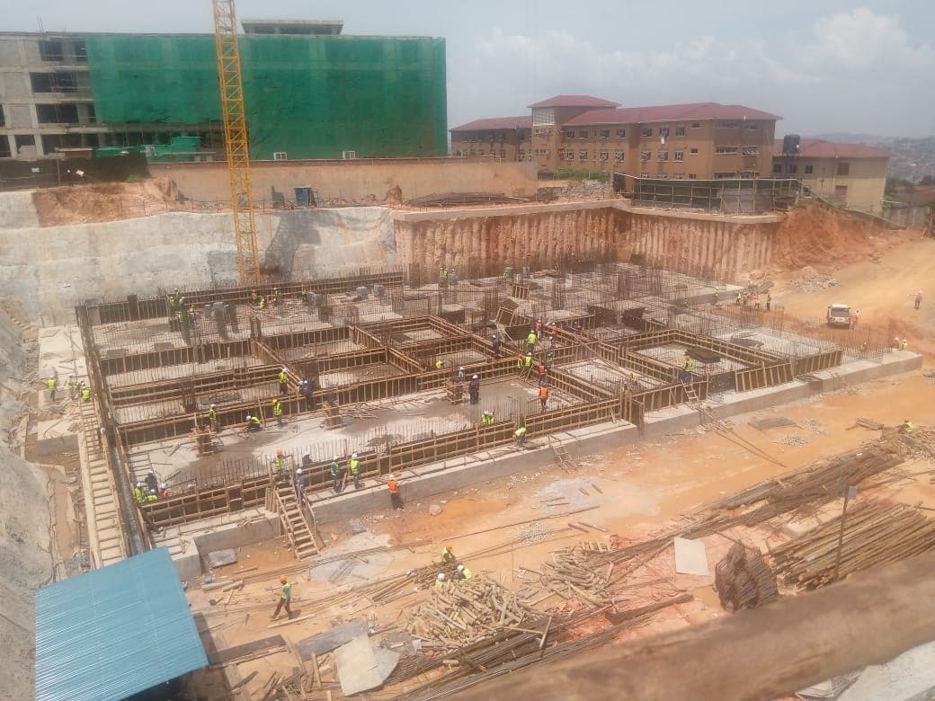 Formwork and reinforced concrete elements arranged across the site