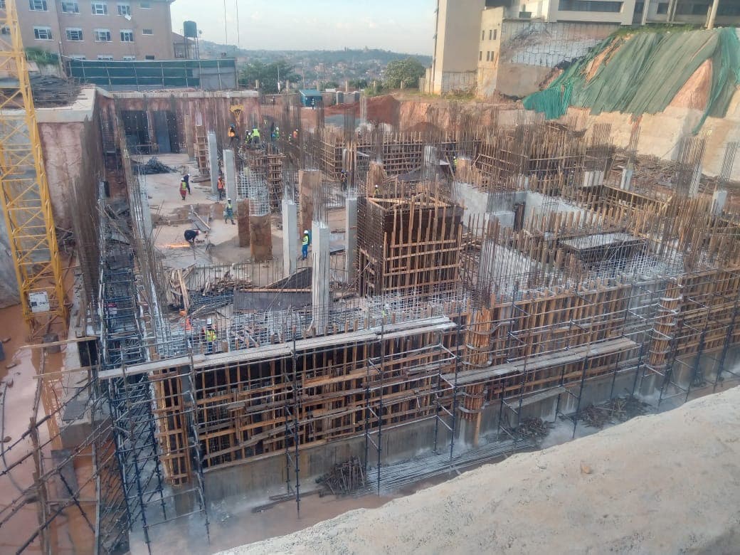 Wall and column formwork rising from a concrete substructure