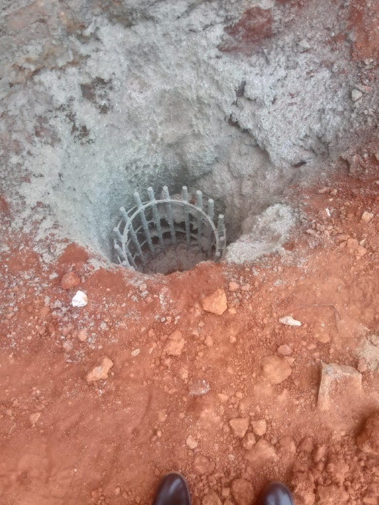 Completed bored pile opening with reinforcement visible